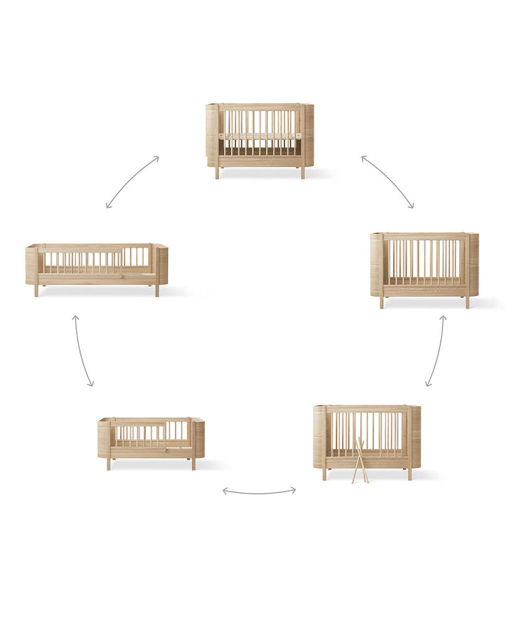 Wood Mini+ Cot Bed Incl. Junior Kit (0-9yrs) - Oak