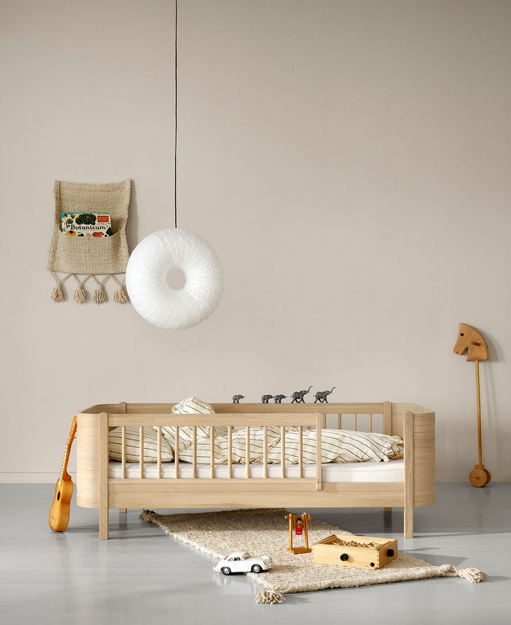 Wood Mini+ Cot Bed Incl. Junior Kit (0-9yrs) - Oak