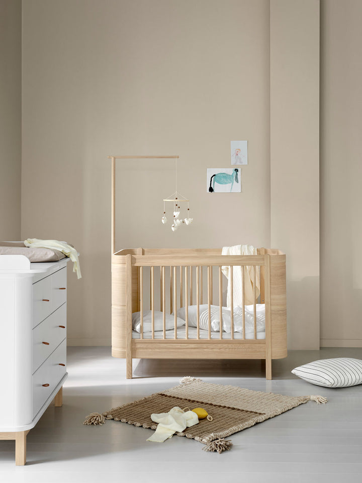 Wood Mini+ Cot Bed Incl. Junior Kit (0-9yrs) - Oak