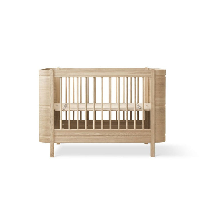 Wood Mini+ Cot Bed Incl. Junior Kit (0-9yrs) - Oak