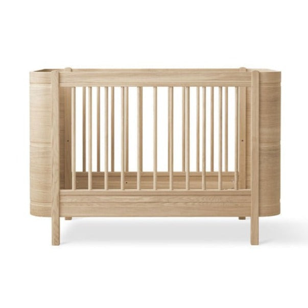 Wood Mini+ Cot Bed Incl. Junior Kit (0-9yrs) - Oak