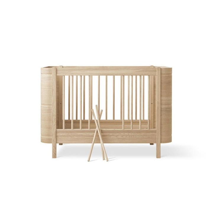 Wood Mini+ Cot Bed Incl. Junior Kit (0-9yrs) - Oak