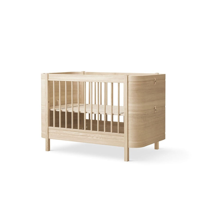 Wood Mini+ Cot Bed Incl. Junior Kit (0-9yrs) - Oak